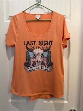 LuLaRoe Orange Scoop Neck Tee with Desert Skull Graphic medium